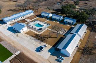 Aerial view of suites, cottages, pool