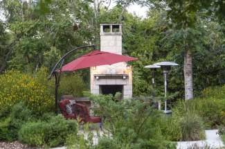 Fireplace overlooking creek