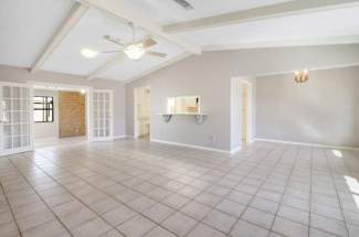 Living/dining looking into sunroom