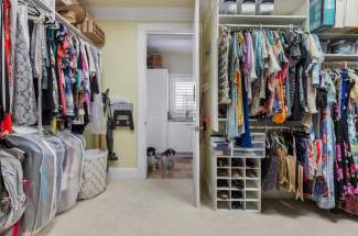 Master closet looking into laundry room