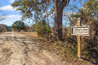 1-driveway-entry-with-sign