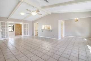 Living/dining looking into sunroom