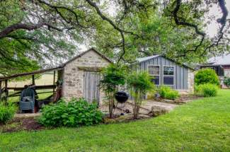 Storage shed, old smoke house and old blacksmith shop