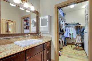 Master bathroom/his closet