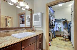 Master bathroom/his closet